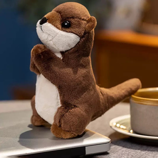 Praying otter toy